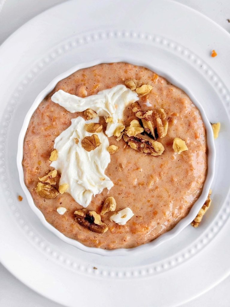 Warm Carrot Cake Protein Bowl with shredded carrots, spices and a cream cheese topping made in the microwave. Healthy carrot cake breakfast bowl is sweetened with protein powder and is low carb and sugar free too.