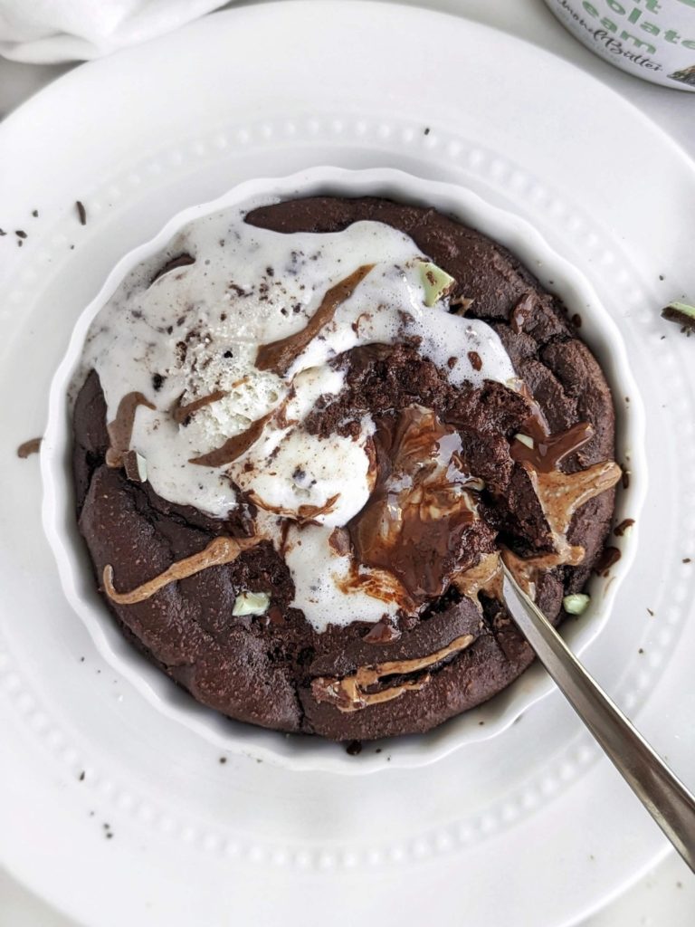 Indulgent Mint Chocolate Protein Dessert bowl that tastes like a fudgy half baked brownie! Easy, healthy single serve recipe with chocolate protein powder, mint chocolate candy and mint chocolate flavor almond butter too!