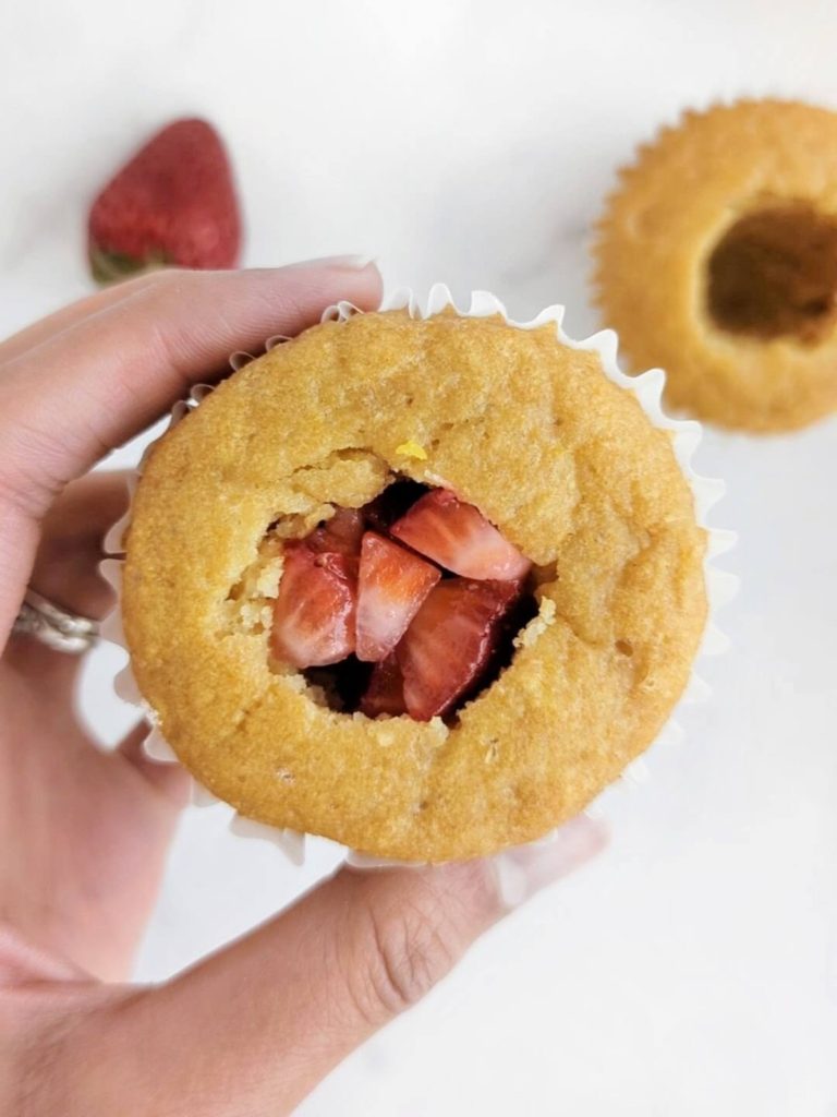 Strawberry Lemon Protein Cupcakes with a strawberry filling and strawberry lemon protein frosting! Healthy, low fat strawberry lemonade cupcakes with protein powder and no added sugar.