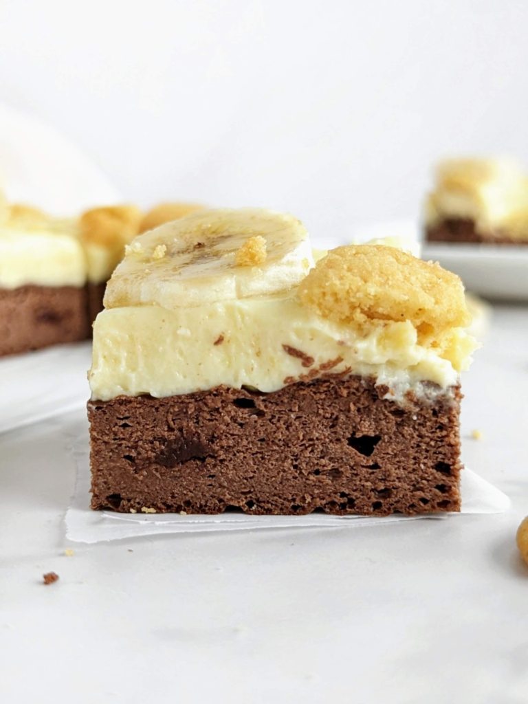 Banana Pudding Protein Brownies will satisfy all all your cravings! Healthy, high protein brownie with sugar free, high protein banana pudding for your next indulgent bake.