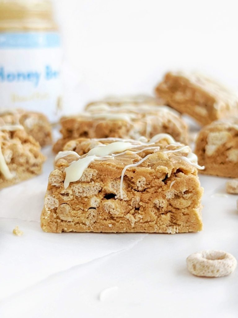 Honey Peanut Butter Protein Bars are the perfect snack for on-the-go. Layered bars with cheerios, peanut butter, peanut butter powder and honey, are high protein, low sugar, lower fat and healthy too!