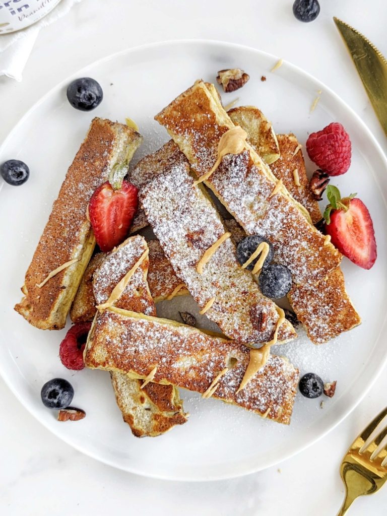 Peanut Butter Protein French Toast Sticks are a delicious and healthy breakfast everyone will love. Made with whole wheat bread and protein powder, pb French Toast sticks are a high fiber, lower calorie and low sugar option.