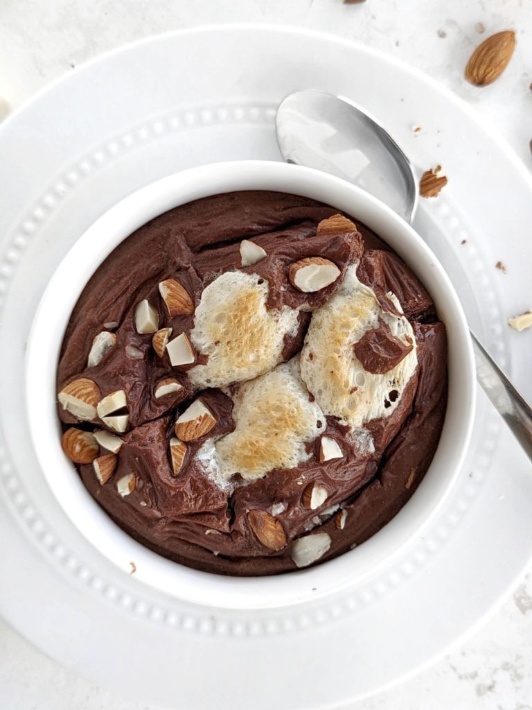 Rocky Road Protein Baked Oats are a delicious and nutritious breakfast or snack. Healthy rocky road oatmeal is made with rolled oats, protein powder, almond milk, and has your favorite ice cream toppings: marshmallow and almonds.