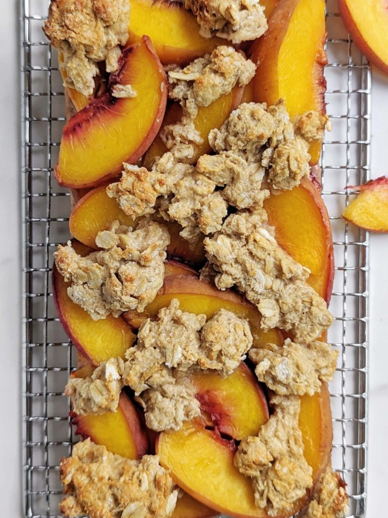 Healthy Peach Crumb Bars - a delightful balance between indulgence and nourishment. With oats, protein powder and egg white these peach crumble bars are high protein, low fat, and added sugar free!