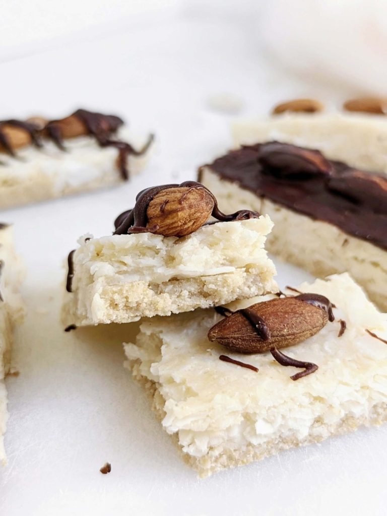 Almond Joy Protein Bars will satisfy candy cravings with health goals in check! A healthy, no sugar, high protein recipe with all the coconut, almond and chocolate vibe.