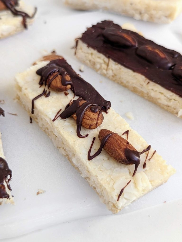 Almond Joy Protein Bars will satisfy candy cravings with health goals in check! A healthy, no sugar, high protein recipe with all the coconut, almond and chocolate vibe.