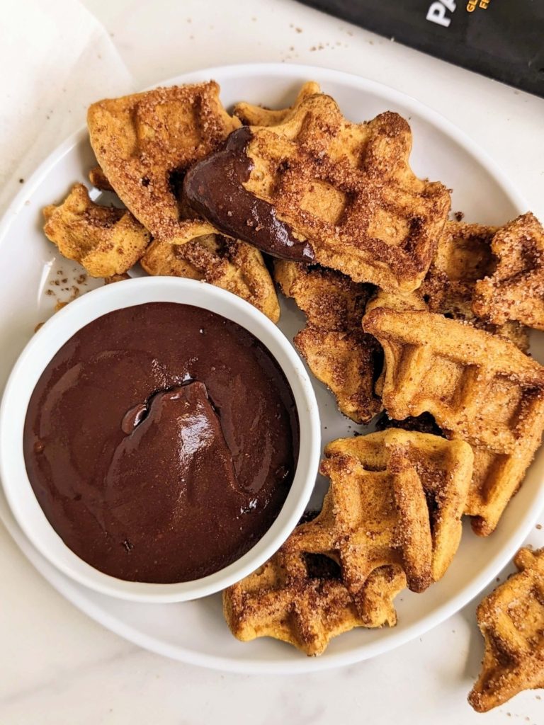 Churro Protein Waffles with a Protein Chocolate Sauce - breakfast that feels like a treat, but fuels your day! A healthy, sugar free recipe.