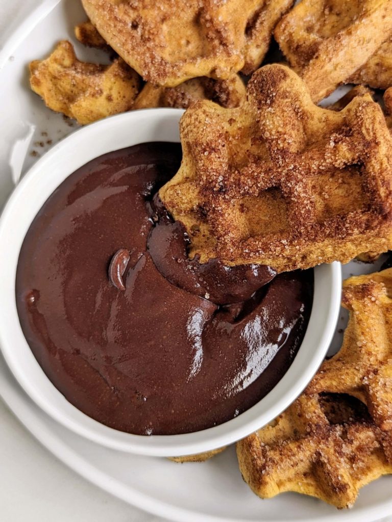 Churro Protein Waffles with a Protein Chocolate Sauce - breakfast that feels like a treat, but fuels your day! A healthy, sugar free recipe.