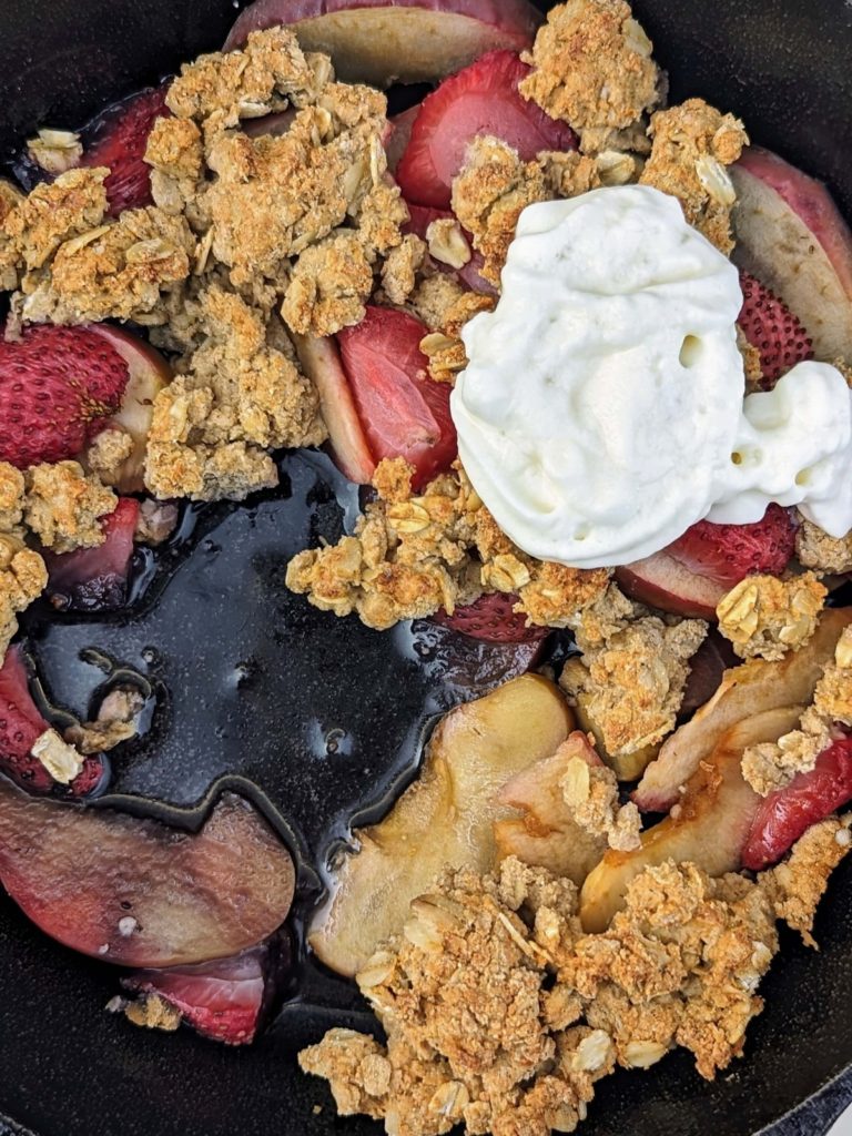 Healthy Strawberry Apple Crisp that's as delicious as it is nutritious! A sweet, but added sugar free blend of apples and strawberries with a high protein, low fat, sugar free and gluten free oat crumble.
