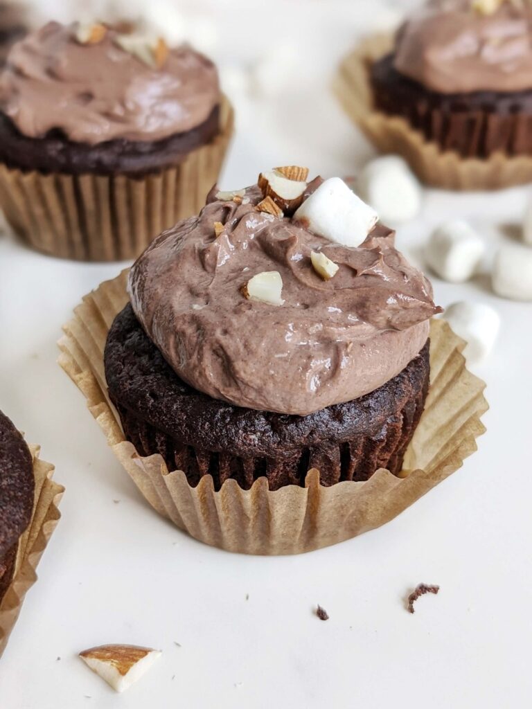 Surprise Rocky Road Protein Cupcakes with a marshmallow almond filling! Healthy, low fat and low sugar rocky road cupcakes are perfect for a party.