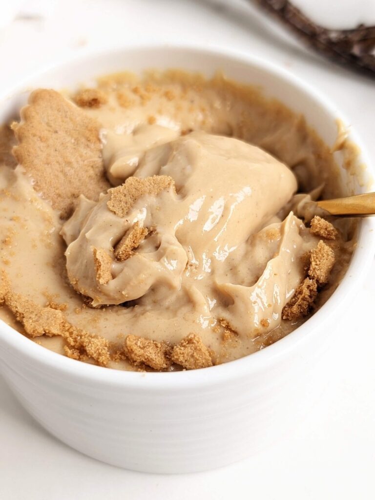 Creamy and cozy Gingerbread Protein Bowl with 40g Protein! This gingersnap yogurt bowl is sweetened with protein powder and has a hint of molasses and all the ginger bread spices too.