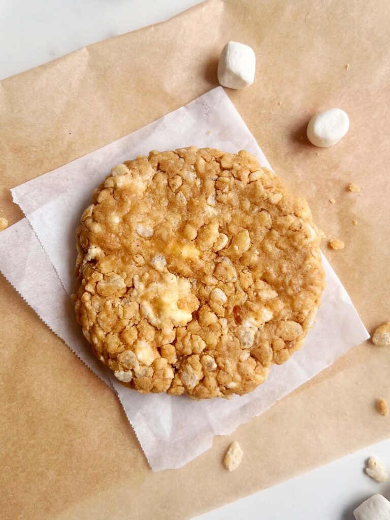 No Bake Rice Krispie Protein Cookie recipe for one made in 5 minutes! This healthy rice krispie treat cookie uses protein powder and peanut butter powder for an extra boost of protein and flavor.