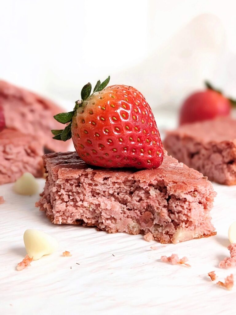 Mind blowing Healthy Strawberry Brownies made with fresh strawberries and protein powder - no cake mix or sugar needed! Protein strawberry brownies are low calorie, low fat, low carb, keto and added sugar free.
