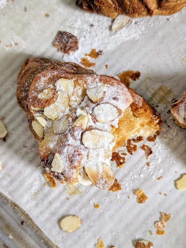 The most easy and BEST Healthy Almond Croissants made with a high protein and low fat almond filling. These almond croissants use protein powder and applesauce instead of sugar and butter.