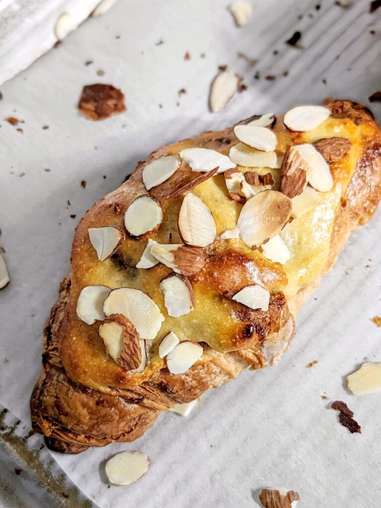 The most easy and BEST Healthy Almond Croissants made with a high protein and low fat almond filling. These almond croissants use protein powder and applesauce instead of sugar and butter.