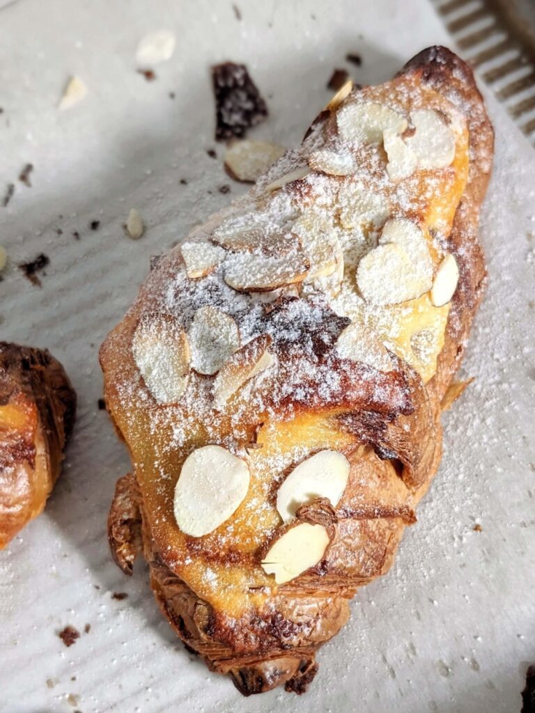 The most easy and BEST Healthy Almond Croissants made with a high protein and low fat almond filling. These almond croissants use protein powder and applesauce instead of sugar and butter.