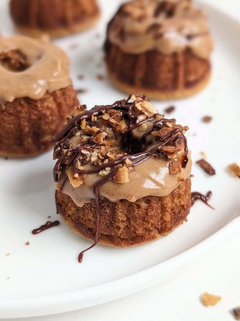 Soft, fluffy and Healthy Samoa Cake made with protein powder and no sugar! Mini Samoa Cookie Bundt Cakes have coconut caramel flavor, but high protein, low fat, low carb and low calorie.