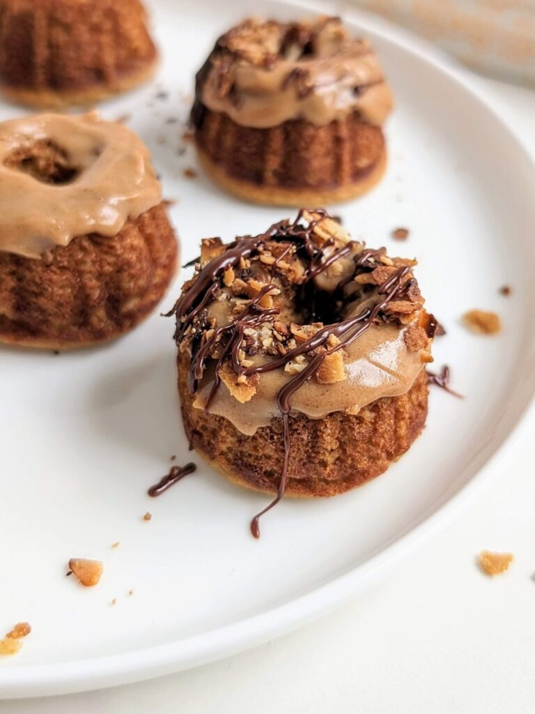 Soft, fluffy and Healthy Samoa Cake made with protein powder and no sugar! Mini Samoa Cookie Bundt Cakes have coconut caramel flavor, but high protein, low fat, low carb and low calorie.