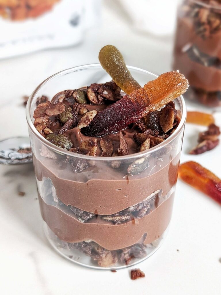 Easy Protein Dirt Pudding with a high protein, low fat and sugar free chocolate pudding and a no sugar chocolate granola. Use protein powder and sugar free Oreos and it’s the perfect healthy Easter treat.