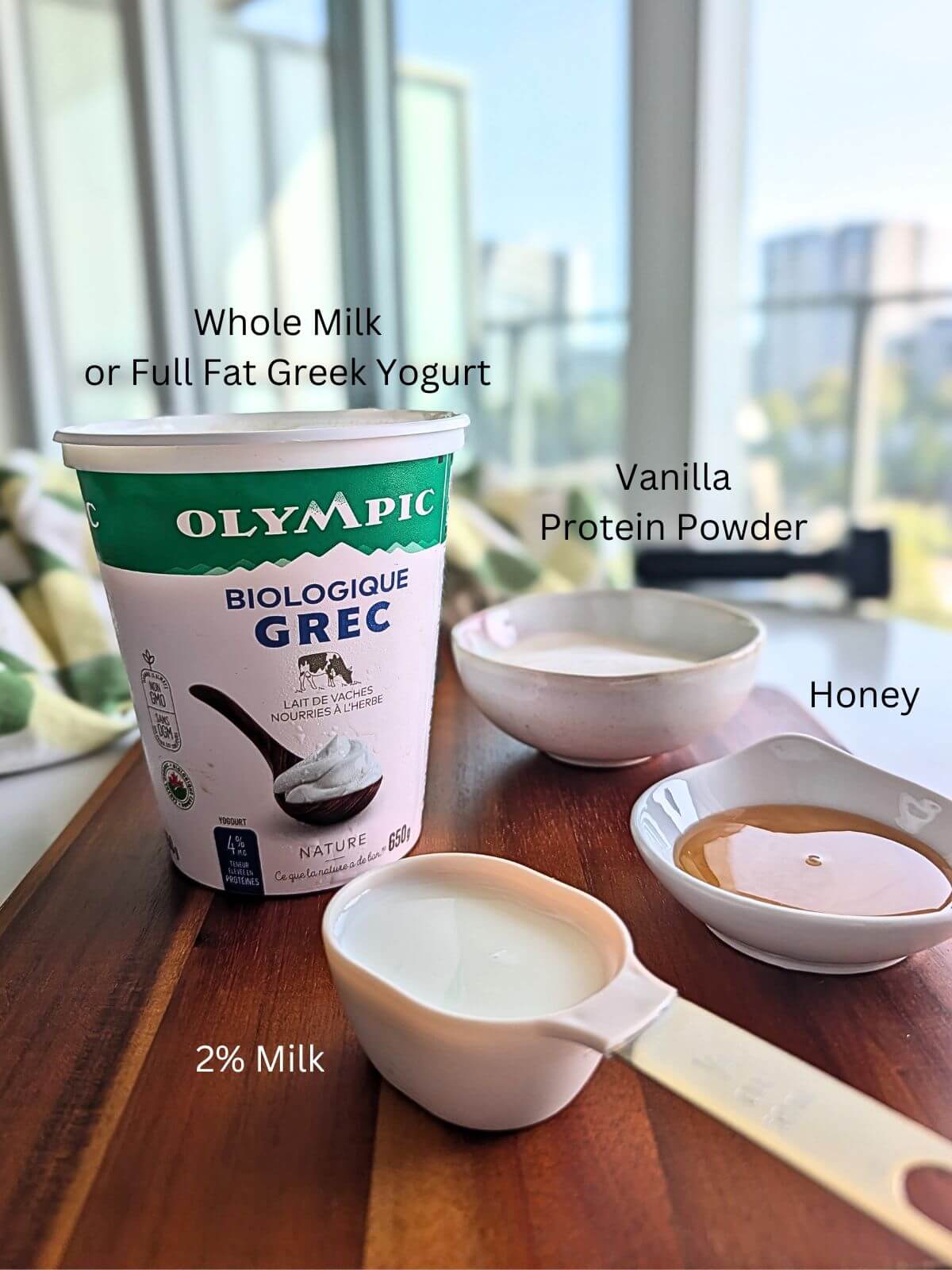 Ingredients for Greek yogurt protein ice cream made with no ice cream maker or Ninja Creami and perfect for a post-workout treat.