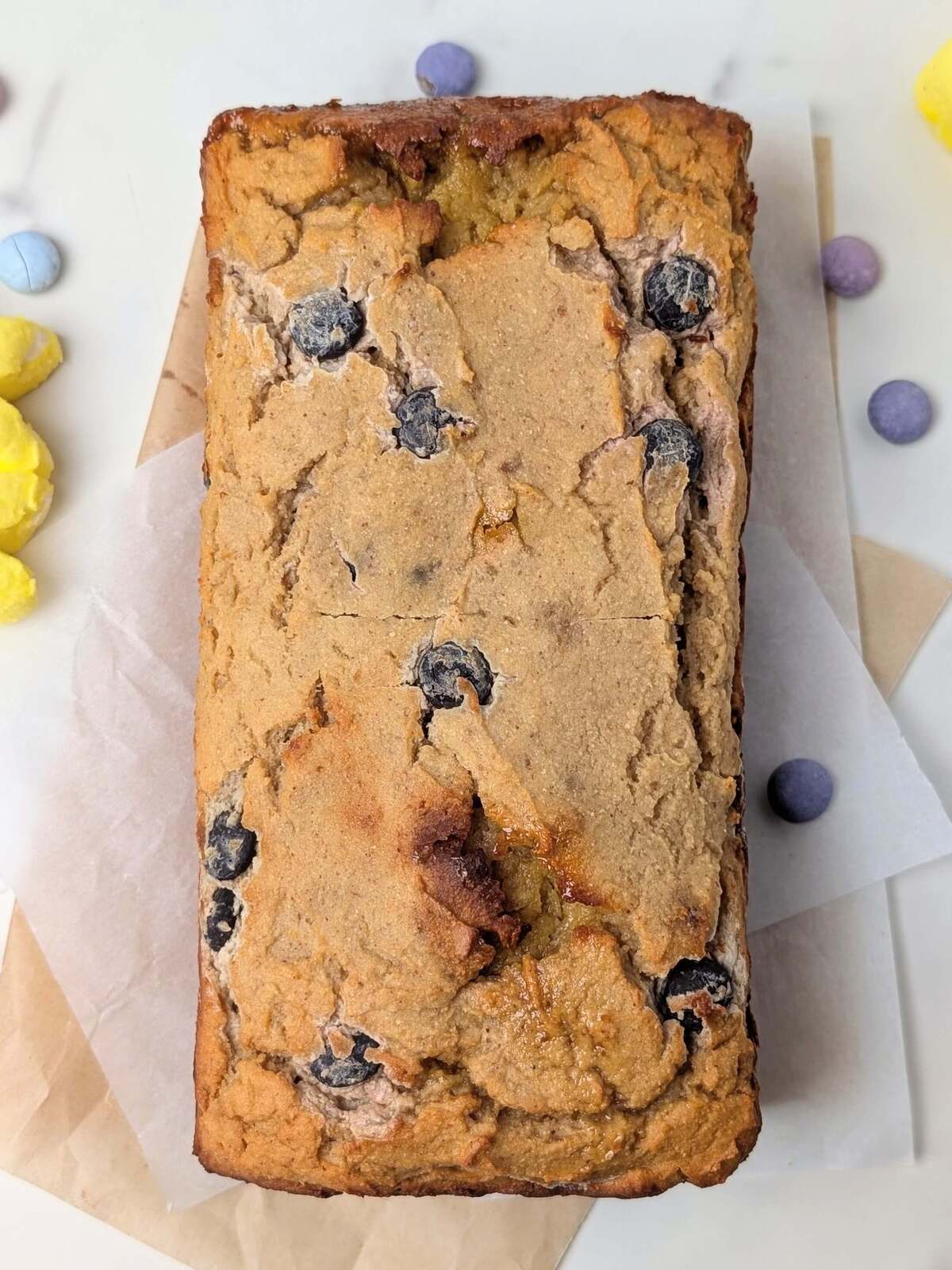 High Protein Healthy Easter Bread recipe loaded with candy coated chocolate and Peeps! A low calorie, low fat and low sugar protein-packed Easter loaf that’s great for a snack or dessert.