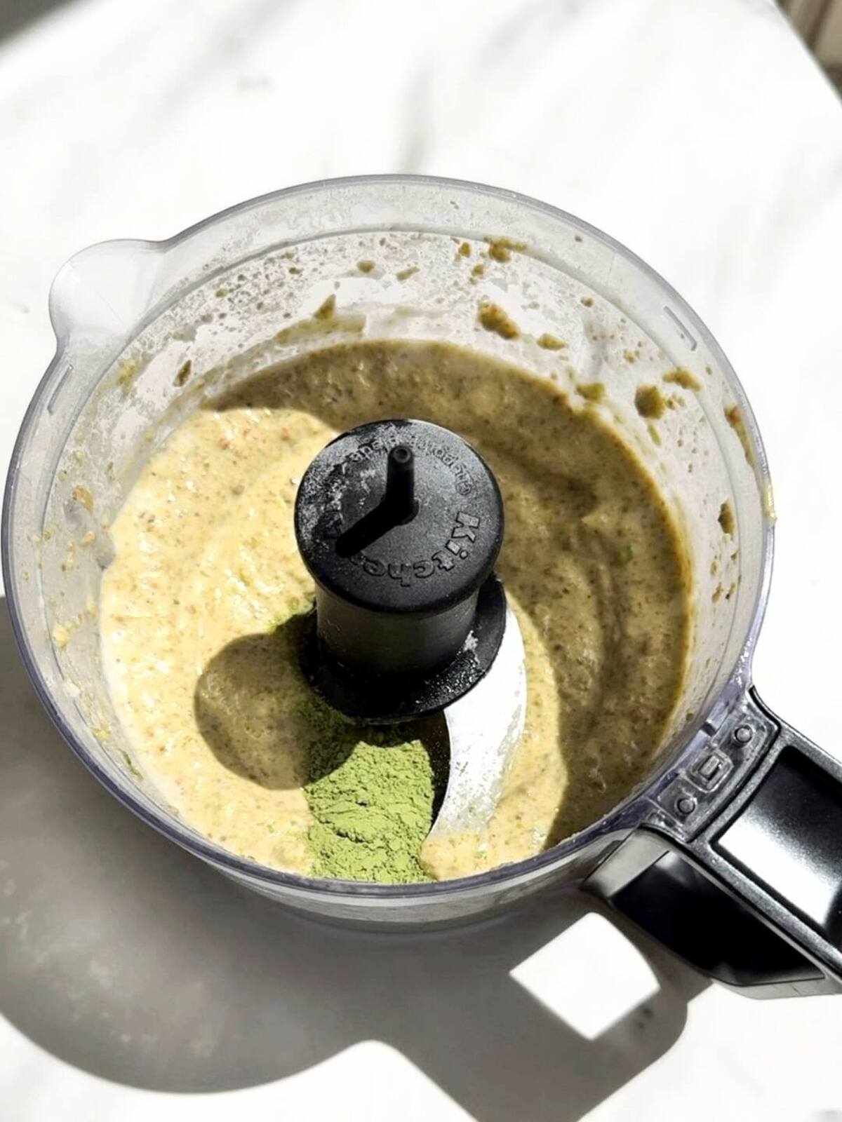 The best Healthy Pistachio Cream recipe out there with no sugar or white chocolate or oil! This high protein pistachio cream uses protein powder and almond milk for a low fat, low calorie, sugar free and keto pistachio dessert spread!