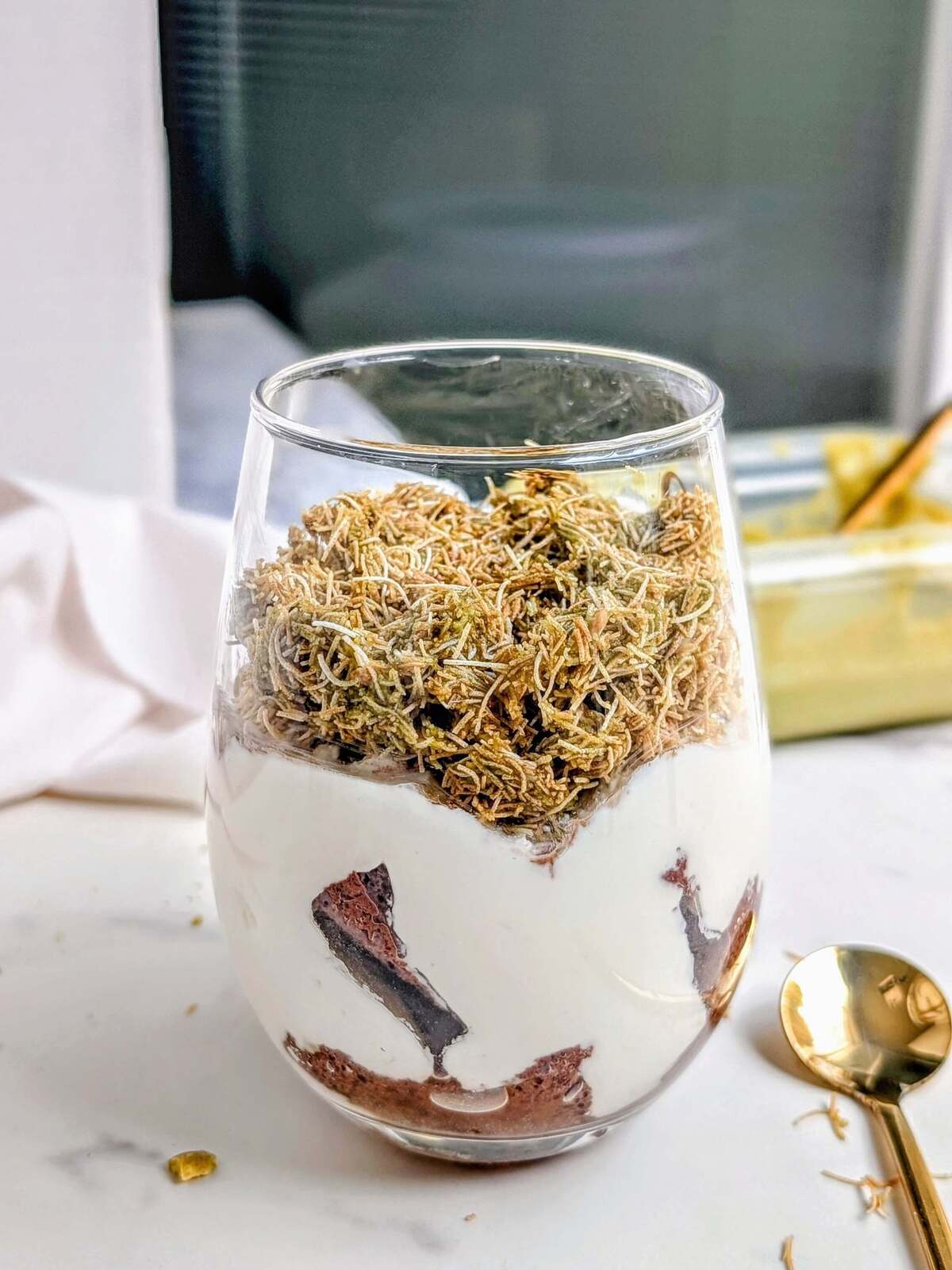 This Dubai Chocolate Tiramisu has a high protein, sugar free label you can’t beat! Layers of coffee-soaked protein chocolate cake, protein cream and protein pistachio kataifi mix will leave you shocked.