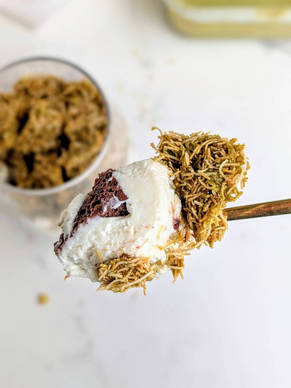 This Dubai Chocolate Tiramisu has a high protein, sugar free label you can’t beat! Layers of coffee-soaked protein chocolate cake, protein cream and protein pistachio kataifi mix will leave you shocked.