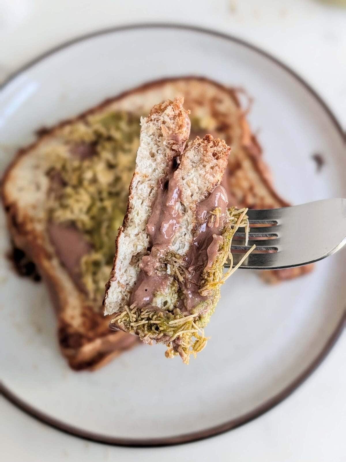 This Dubai Chocolate French Toast recipe will elevate your breakfast or dessert game! An exquisite high protein, lower fat and low sugar pistachio chocolate stuffed french toast you’re going to love!