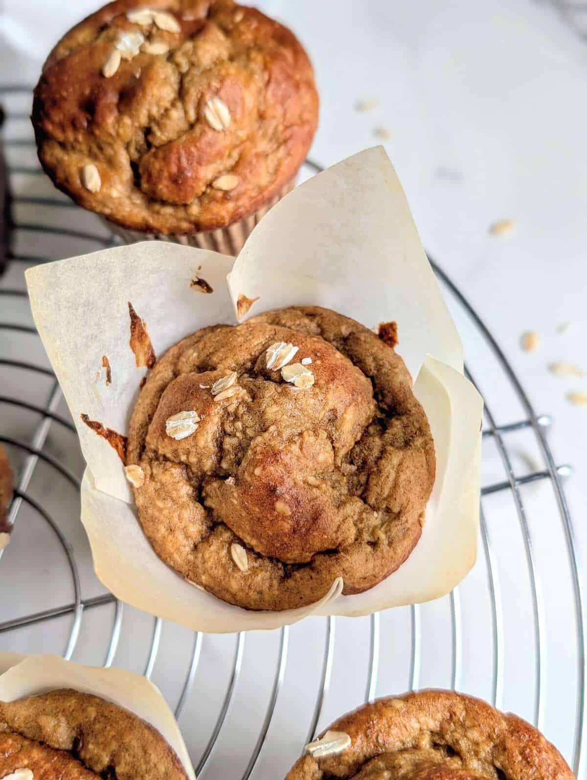 These Banana Protein Muffins without Protein Powder are packed with protein from Greek yogurt, protein oats and peanut butter powder. These banana oat high protein muffins are perfect for breakfast, a snack, or even a healthier dessert.
