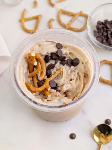 The best Salted Caramel Protein Ninja Creami Ice Cream recipe that’s creamy and satisfying, but still healthy! An easy, keto friendly salted caramel creami recipe that’s even customizable with chocolate chips and pretzels!