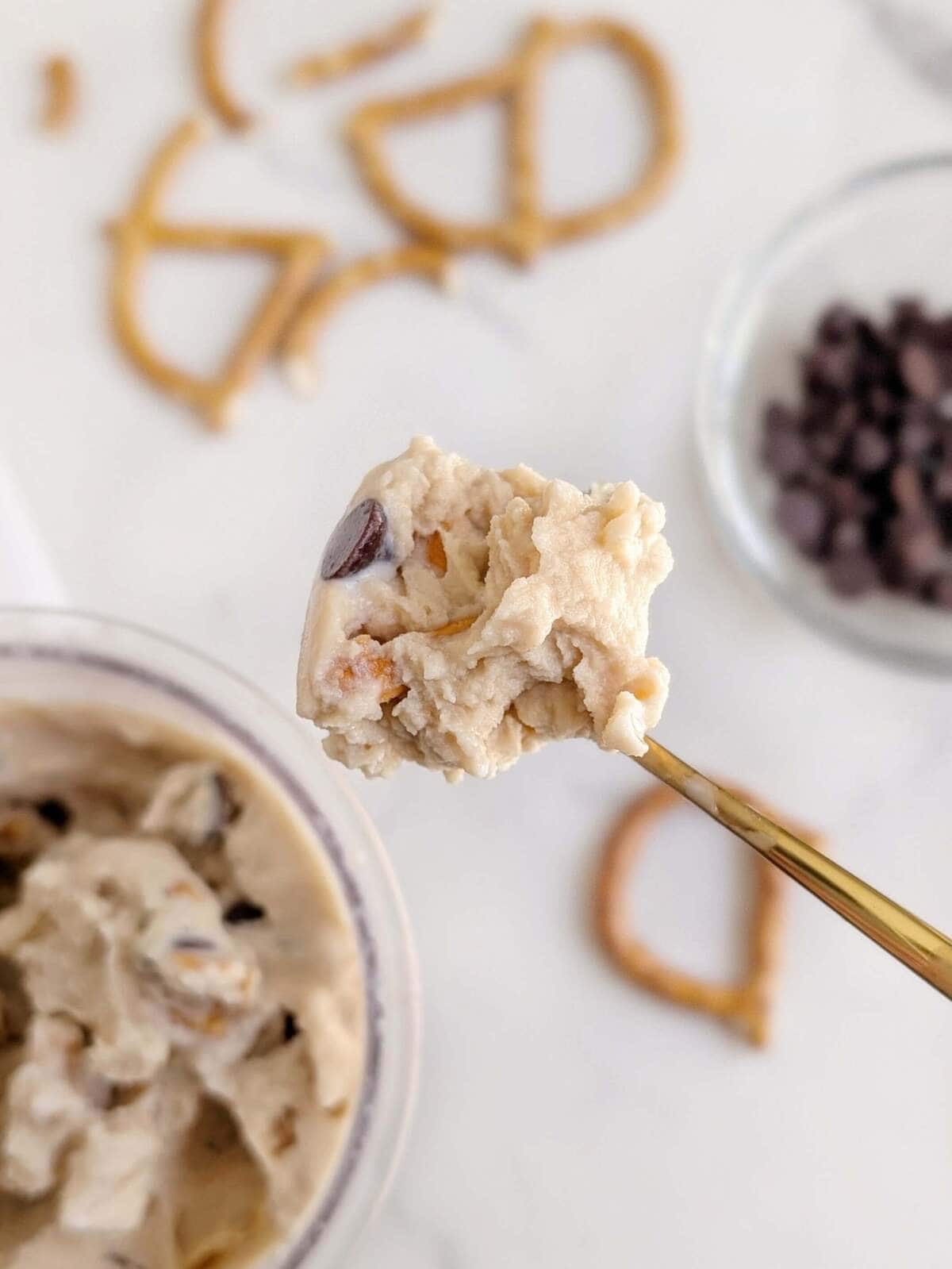 The best Salted Caramel Protein Ninja Creami Ice Cream recipe that’s creamy and satisfying, but still healthy! An easy, keto friendly salted caramel creami recipe that’s even customizable with chocolate chips and pretzels!