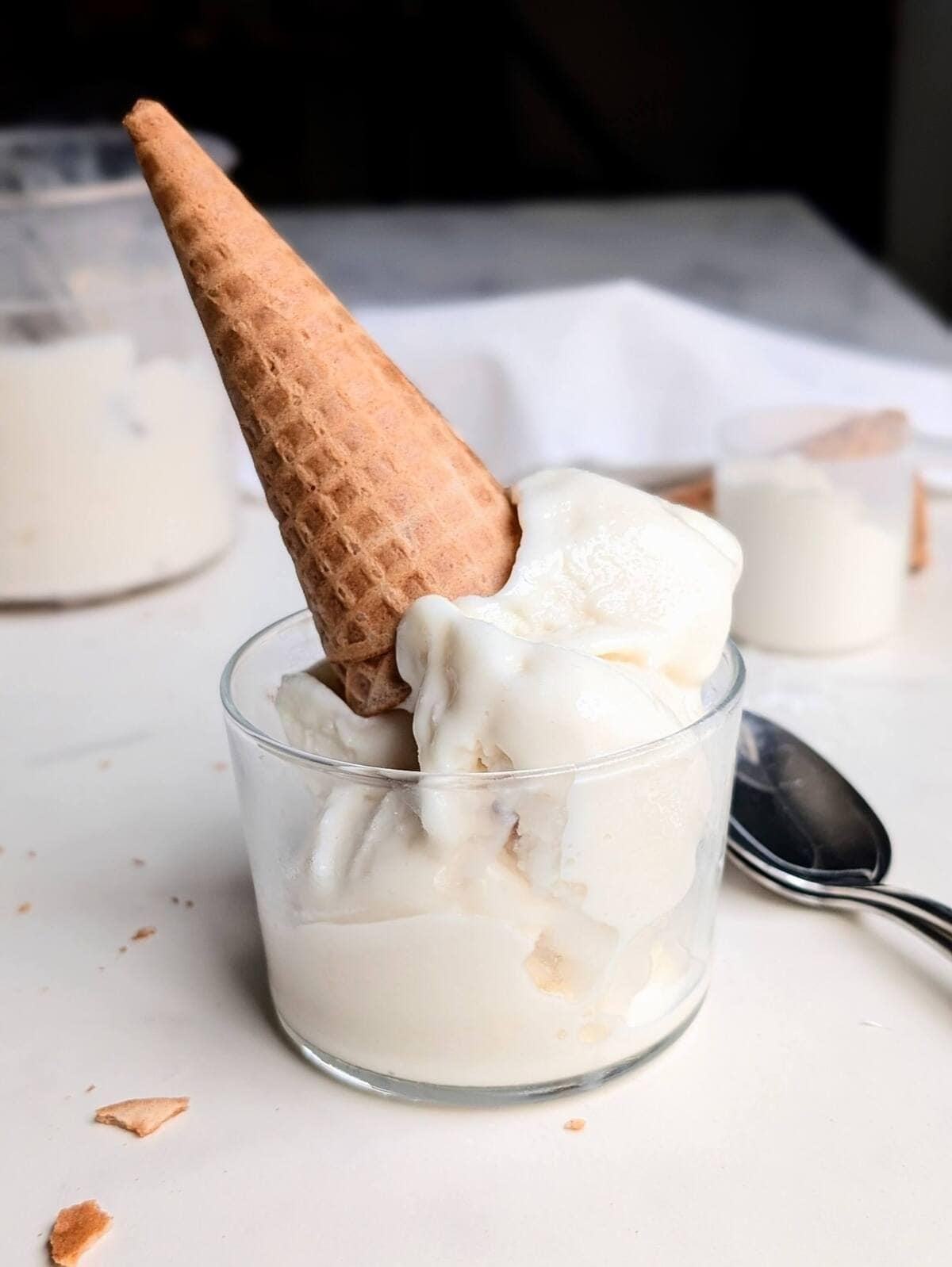 This low-calorie Ninja Creami Vanilla Protein Ice Cream is packed with 40g protein and has no sugar! The perfect recipe for late-night ice cream cravings and the best base for any mix-ins!