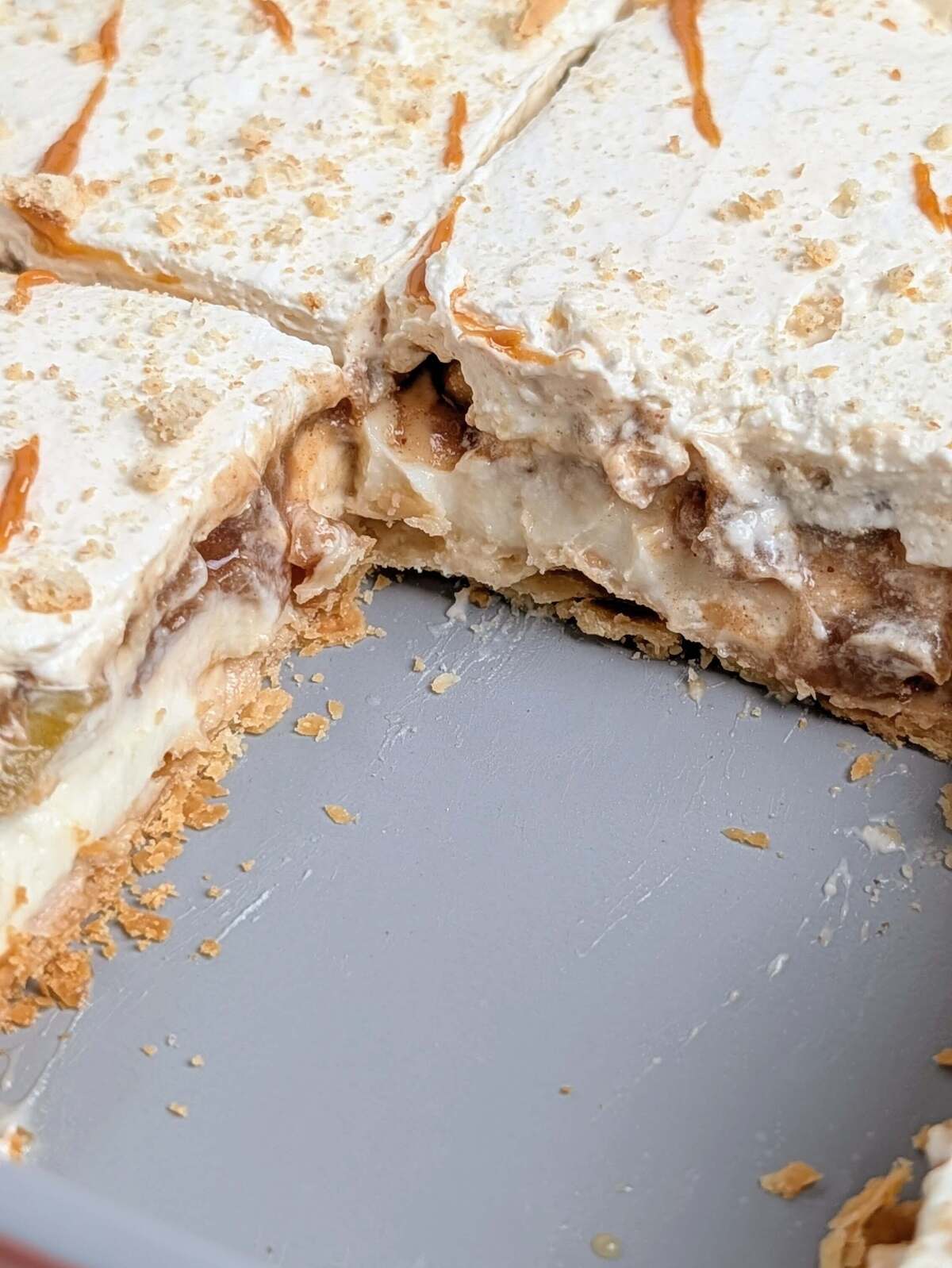 Healthy Apple Pie Lasagna is the ultimate twist on a classic holiday pie. Crunchy pie crust, high protein pudding, low-sugar apple pie filling and protein whipped topping - a decadent dessert without guilt.