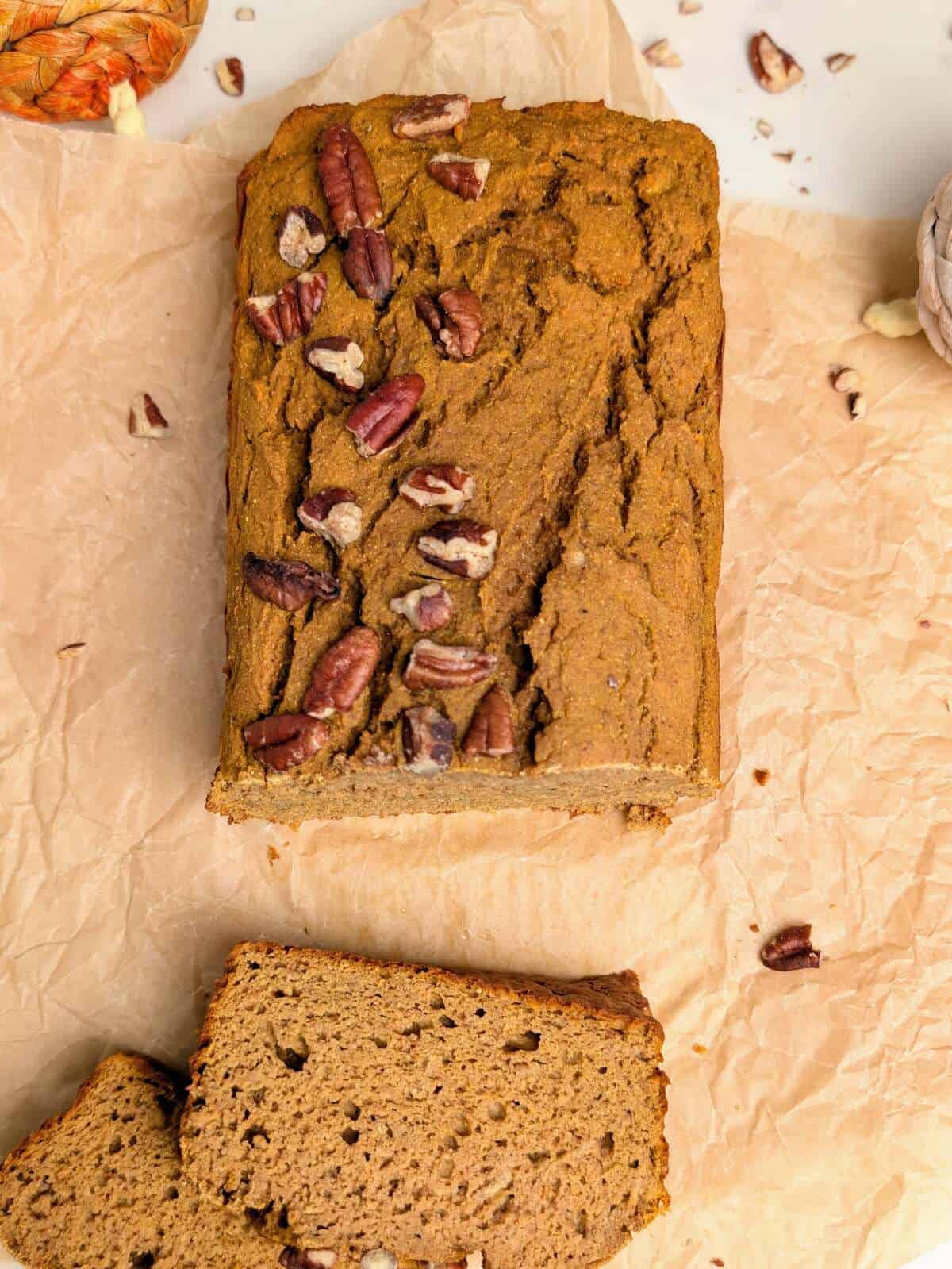 Bake the ultimate high protein healthy pumpkin banana bread! A moist, satisfying protein loaf that's macro-friendly with no added refined sugar.
