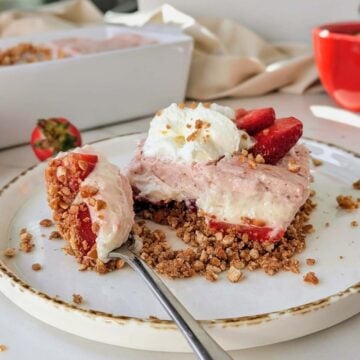 The best healthy strawberry lasagna recipe with sugar free, high protein base and pudding layers! An easy no bake strawberry lasagna recipe with no butter.