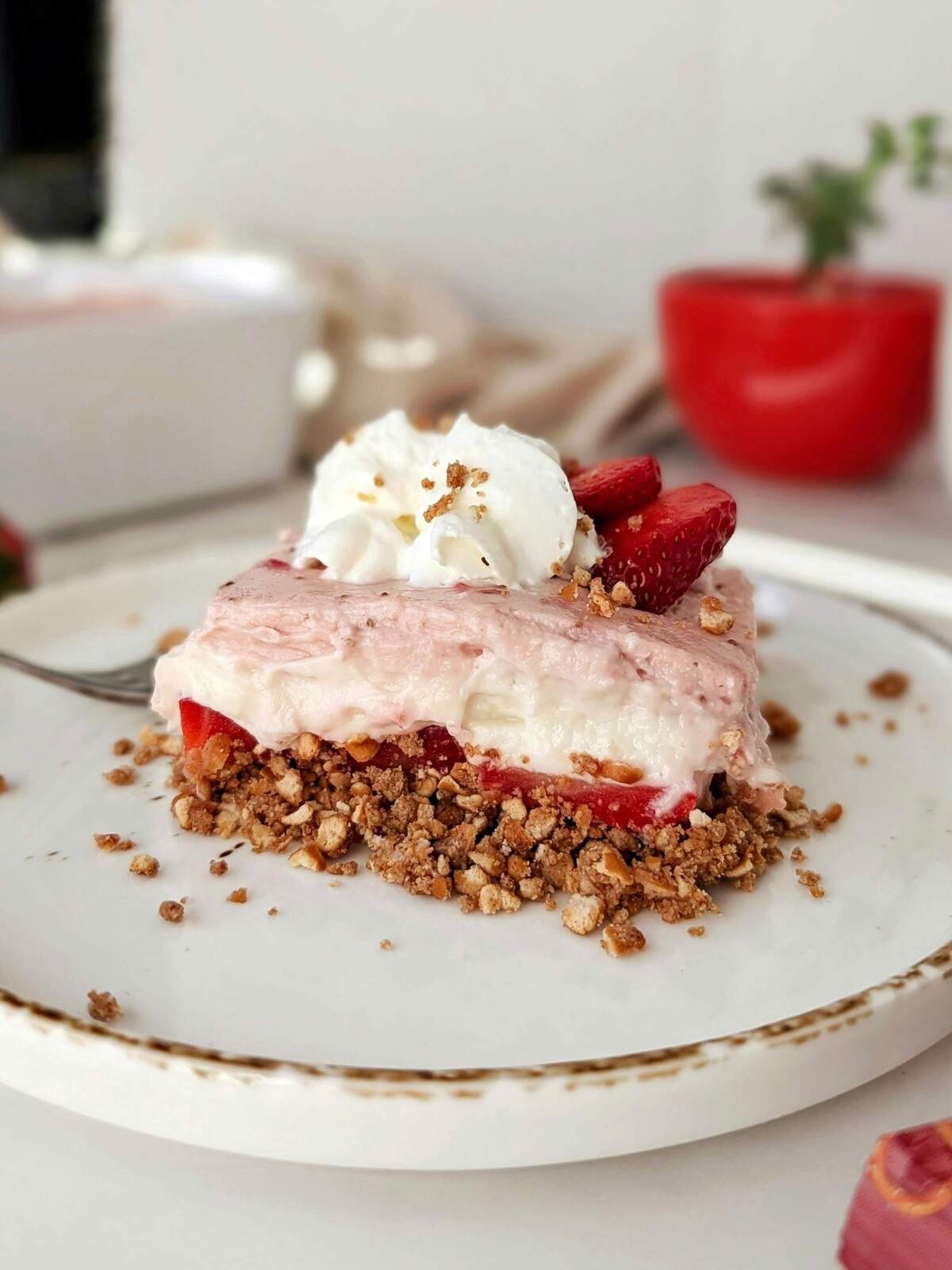 The best healthy strawberry lasagna recipe with sugar free, high protein base and pudding layers! An easy no bake strawberry lasagna recipe with no butter.