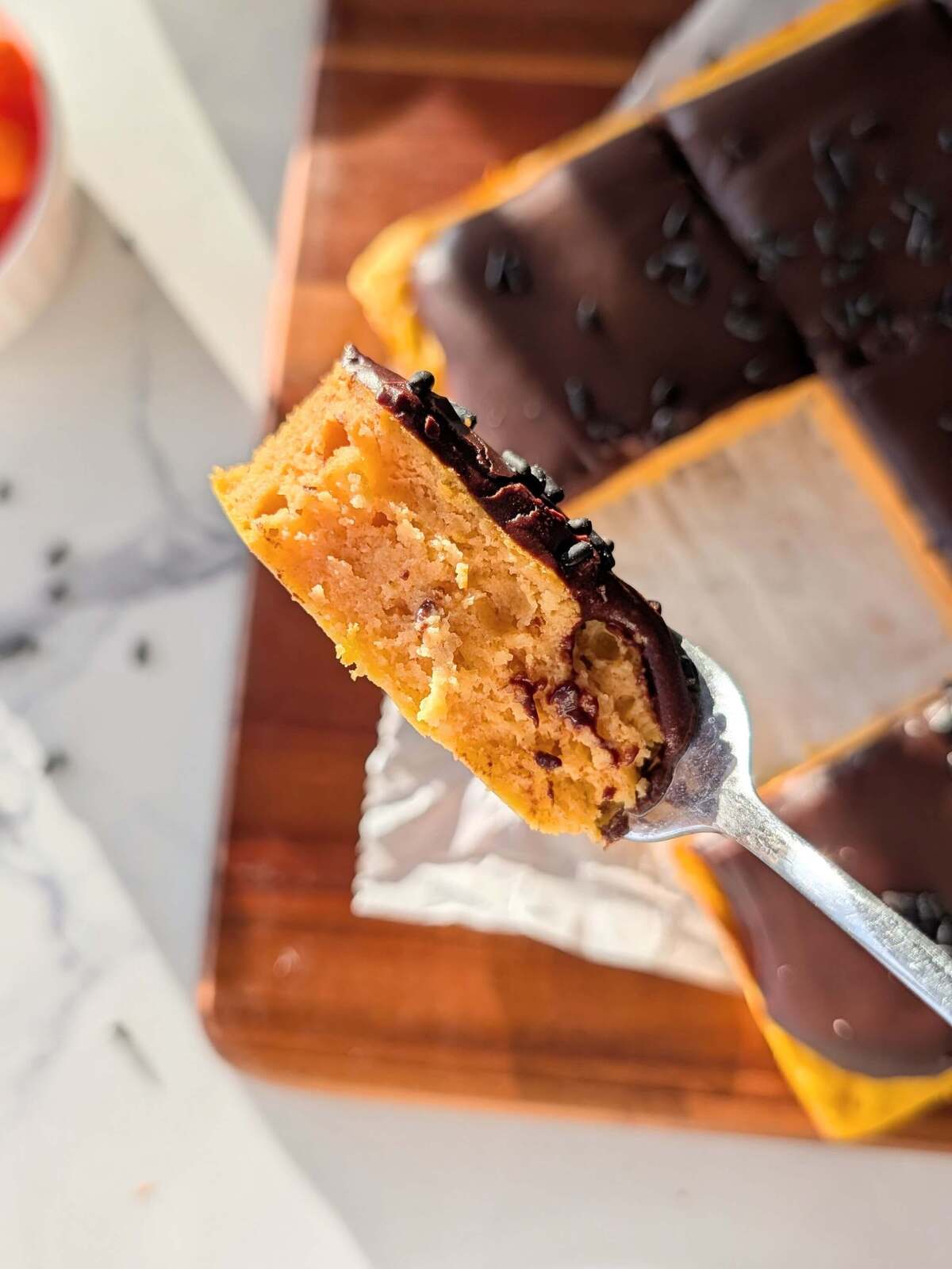 This Healthy Brazilian Carrot Cake is a total game-changer! A high-protein, blender carrot cake topped with a rich chocolate ganache. Only 10 mins of prep!