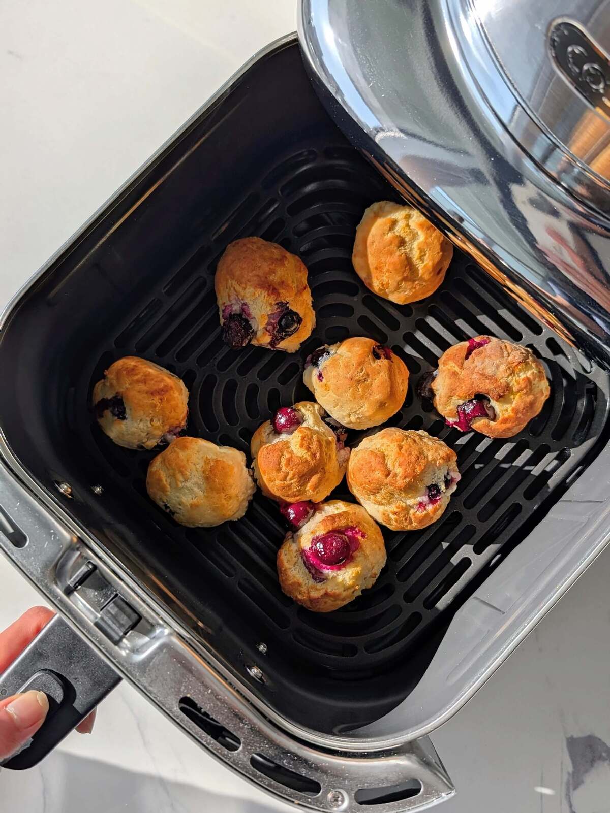 Skip the deep frying with these Air Fryer Lemon Blueberry Protein Donut Holes! 5-minute cook time, no yeast, and a sugar-free glaze. The perfect low-calorie, healthy snack.