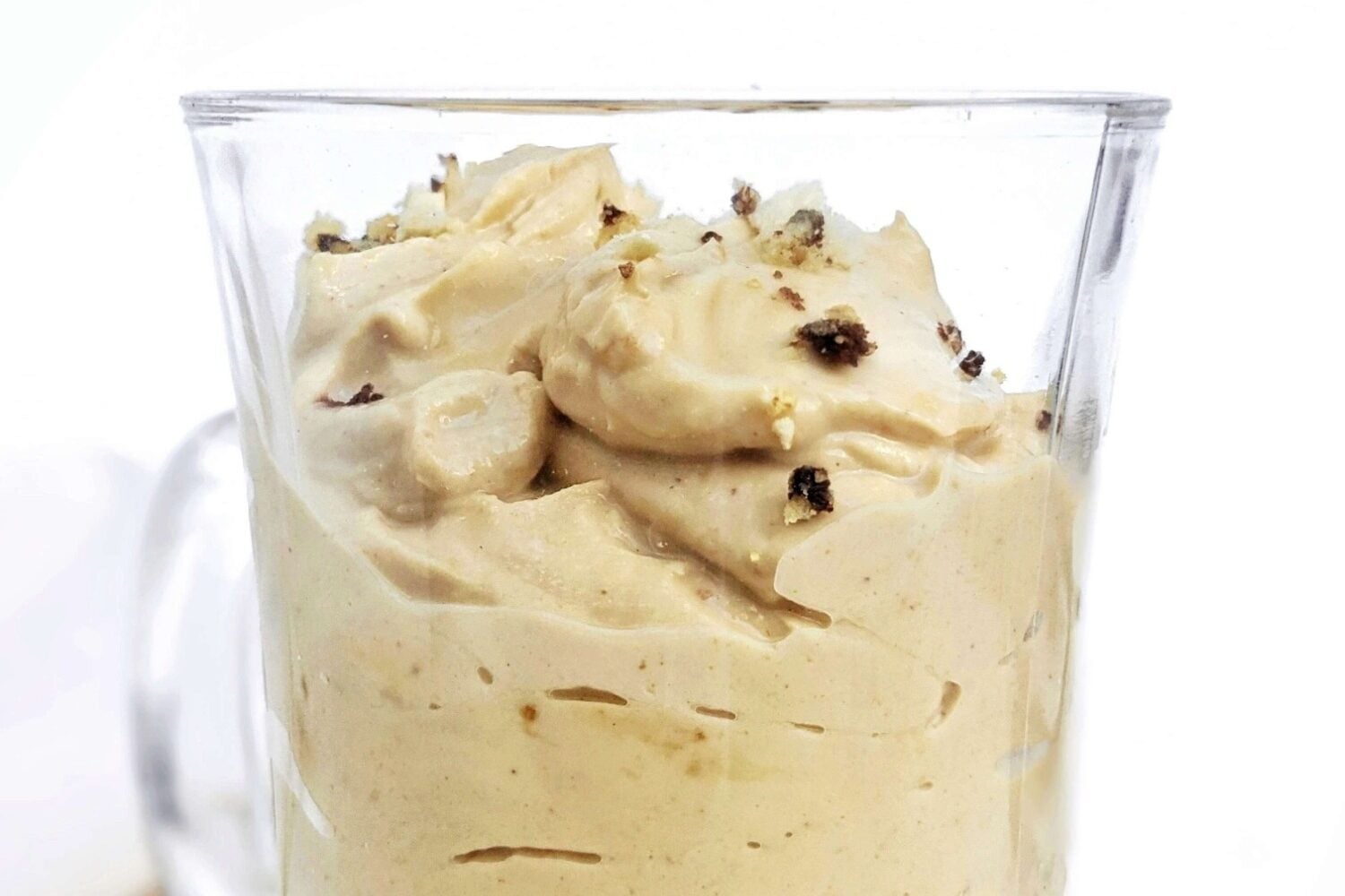 A quick, easy and creamy Peanut Butter Protein Mousse with protein powder, Greek yogurt and powdered peanut butter. Healthy powdered peanut butter mousse has no heavy cream or cream cheese, and is low calorie, low carb, keto and easily Vegan too!