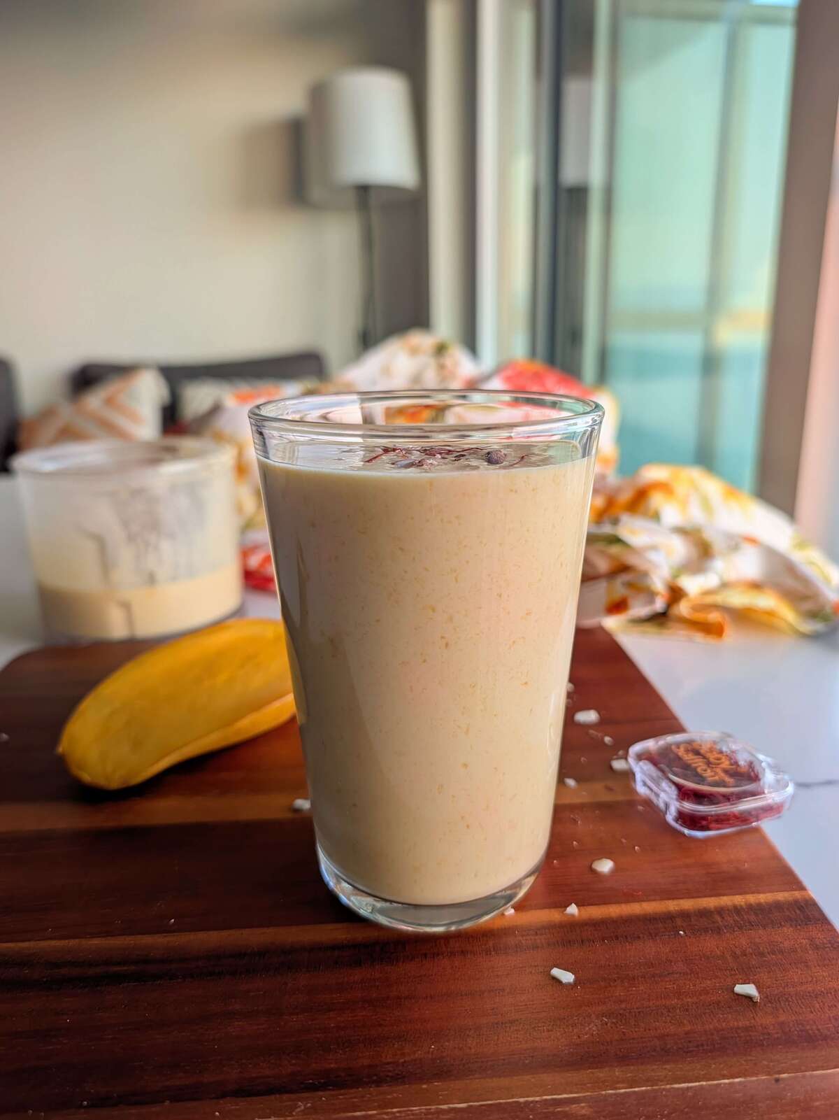 A thick, saffron-flecked mango lassi blended with Greek yogurt and protein powder for almost 30g of protein per glass. Works in a blender or a food processor.