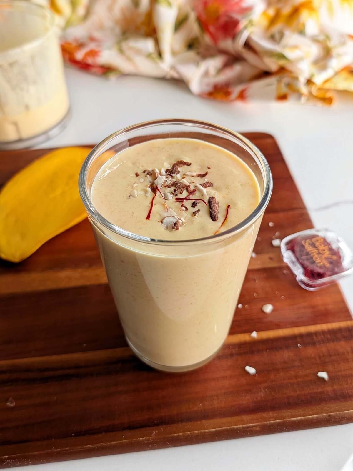 A thick, saffron-flecked mango lassi blended with Greek yogurt and protein powder for almost 30g of protein per glass. Works in a blender or a food processor.