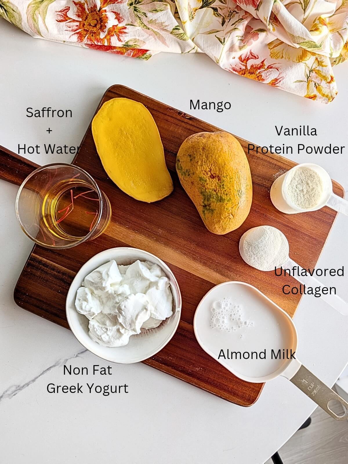 Ingredients for high protein mango lassi.