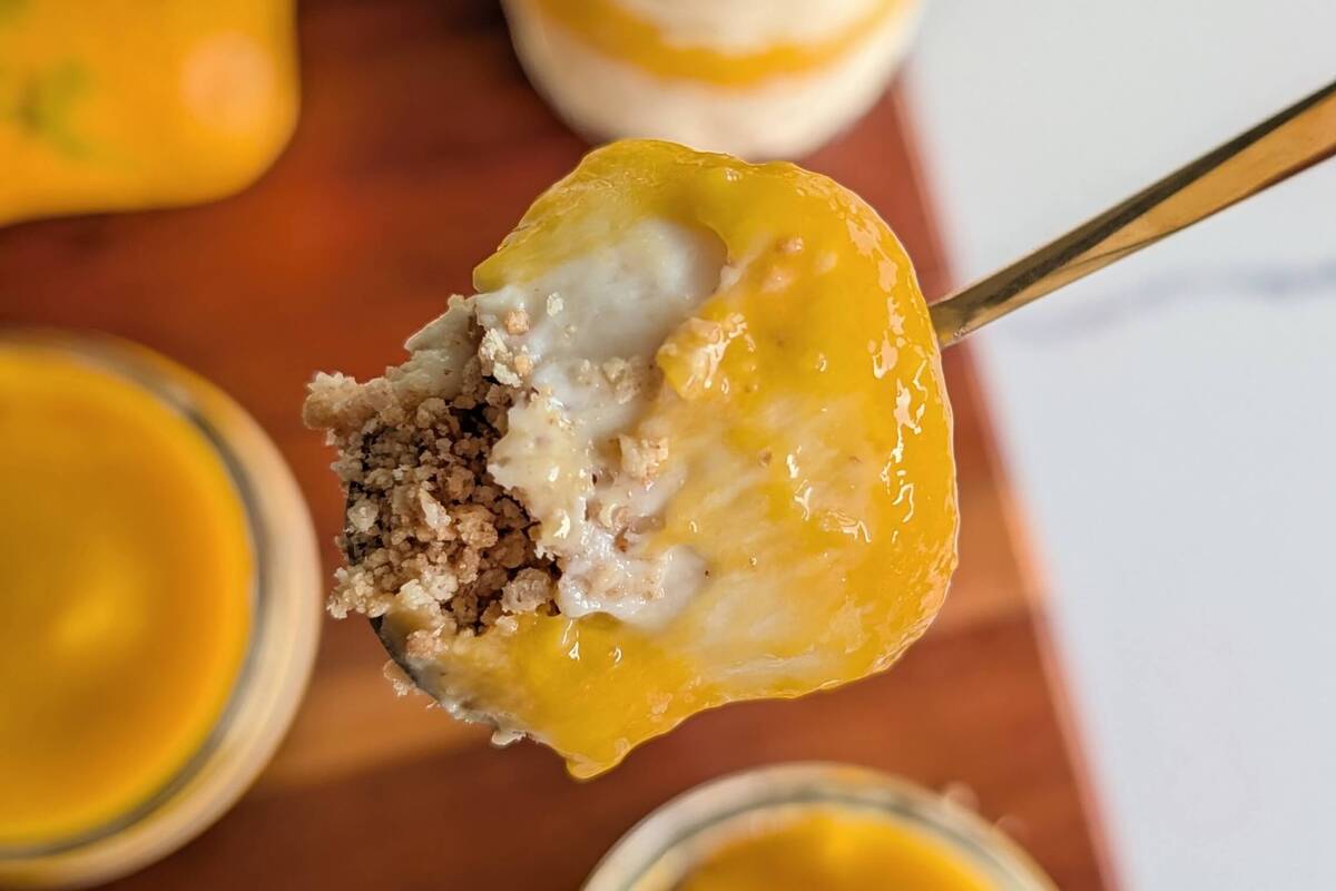 This high-protein mango cheesecake is a no-bake, no-gelatin dessert layered in individual jars, with 19 grams of protein per serving.