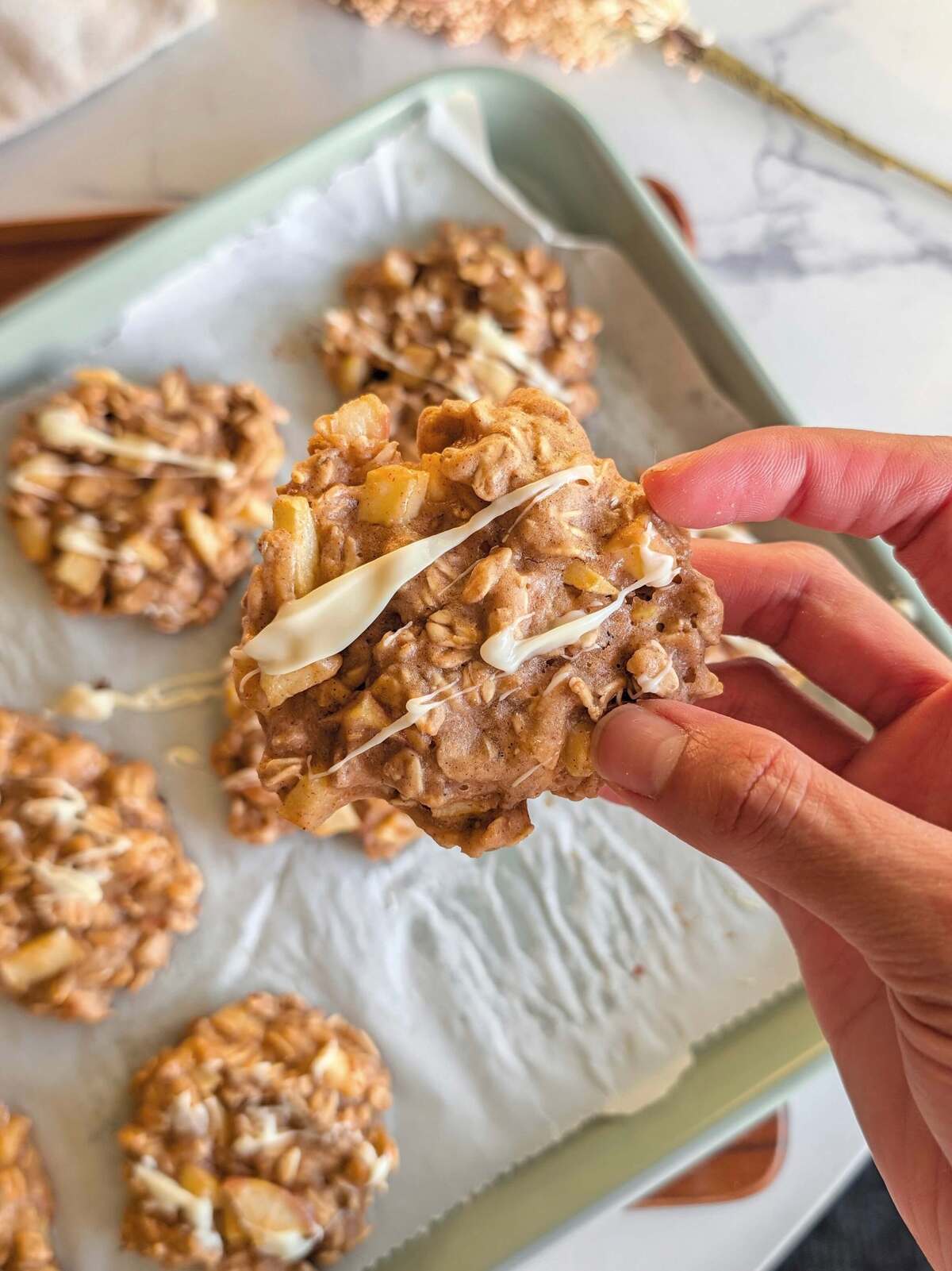 These high protein apple oatmeal cookies are soft, low in sugar, and 7g of protein for 102 calories each - easy enough for breakfast and good enough that you'll want them as a snack to satisfy that sweet tooth.